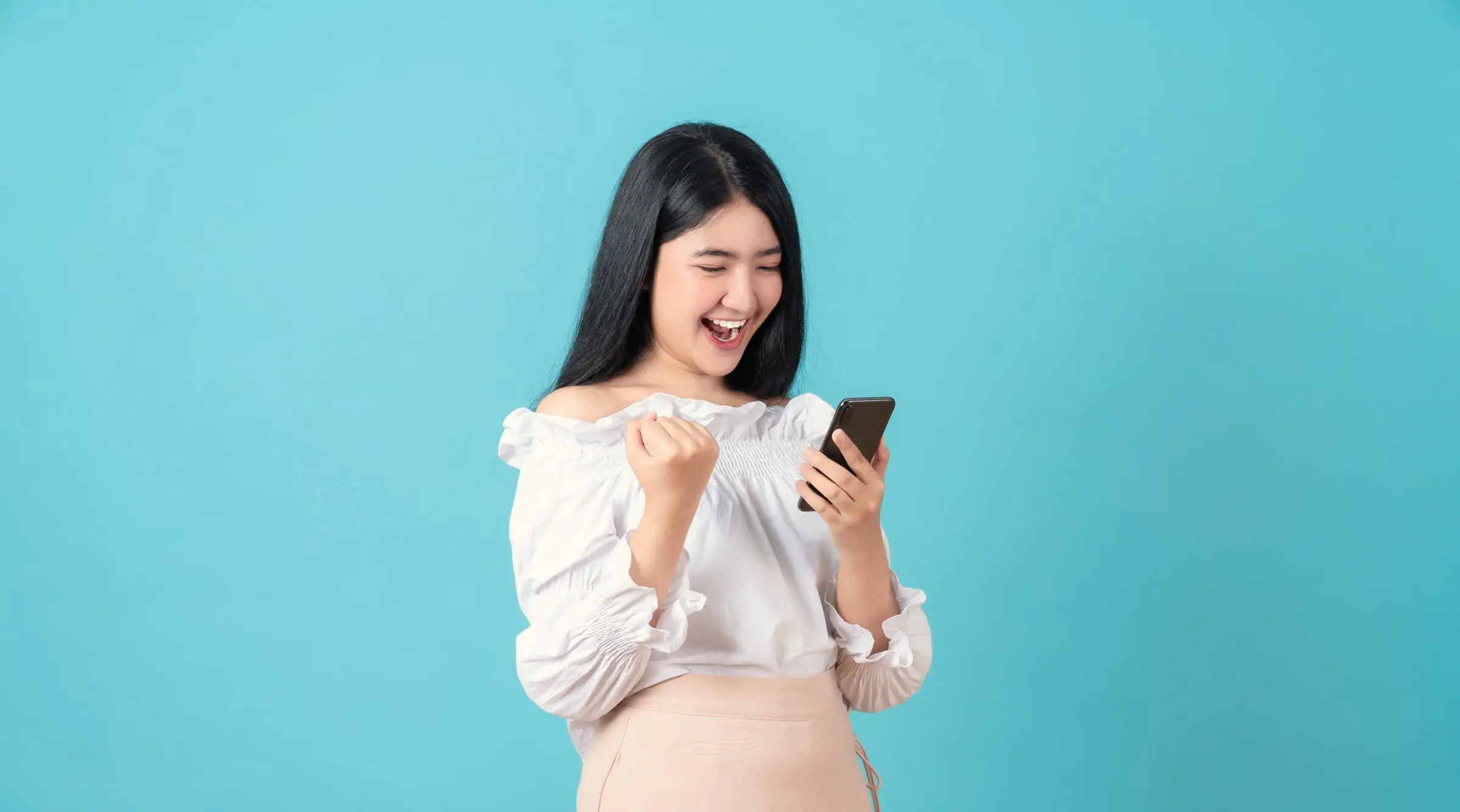 Woman excited about QPER Health